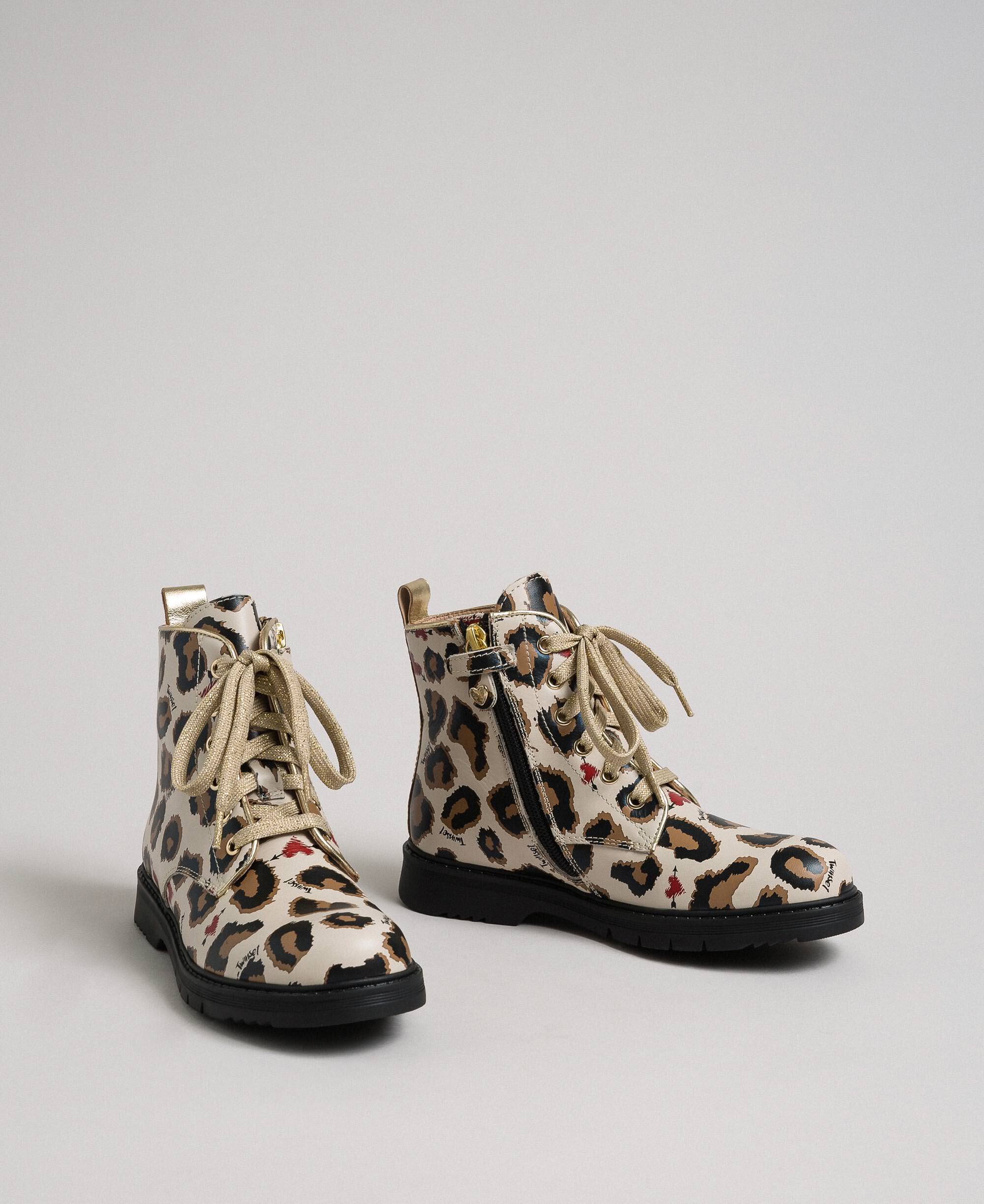 Leather combat boots with animal print 