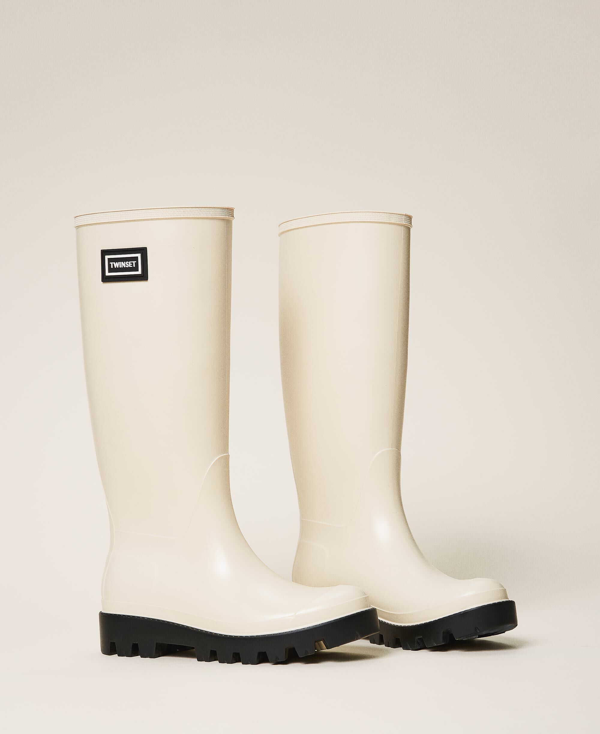 beige rain boots