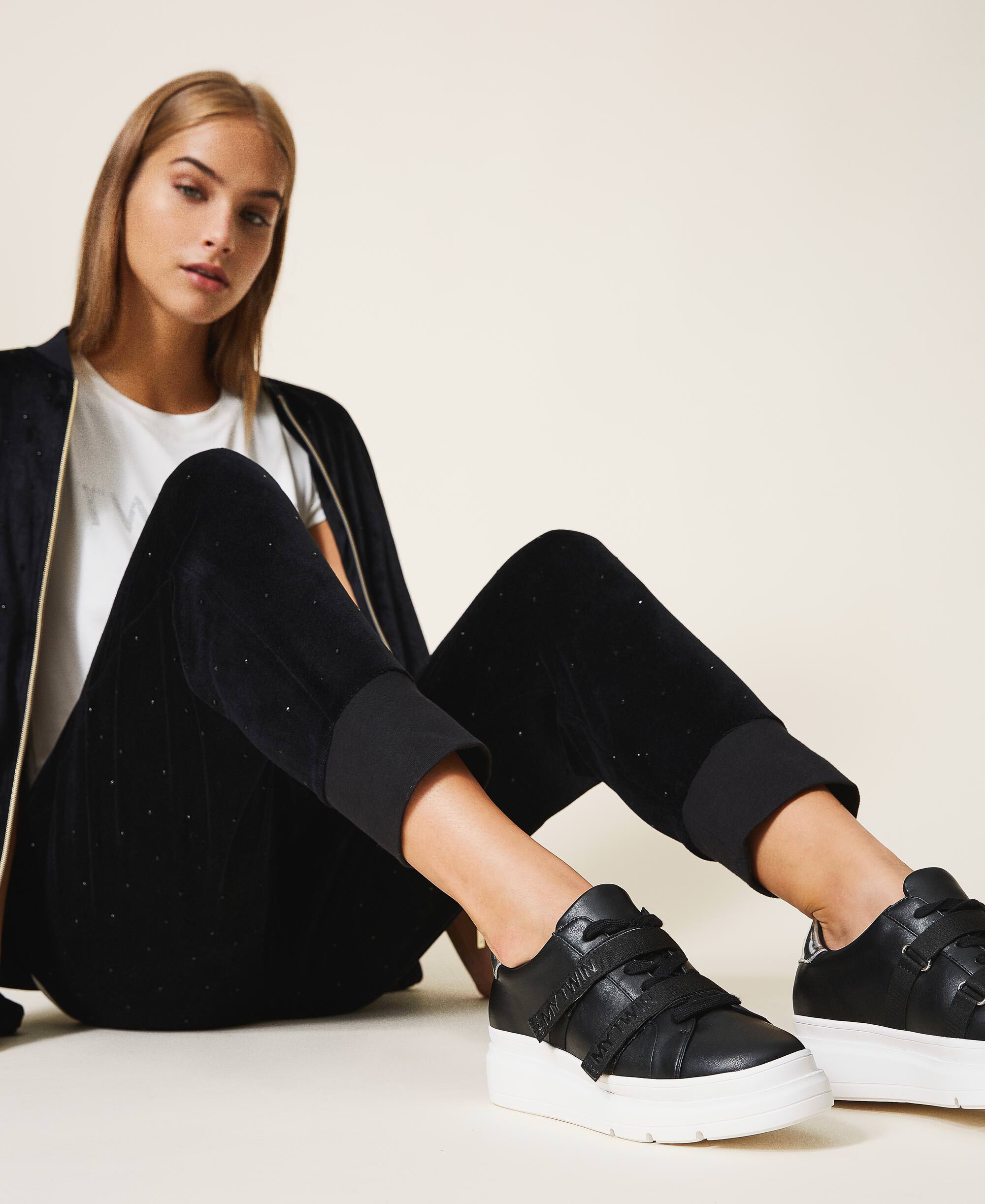 black faux leather trainers