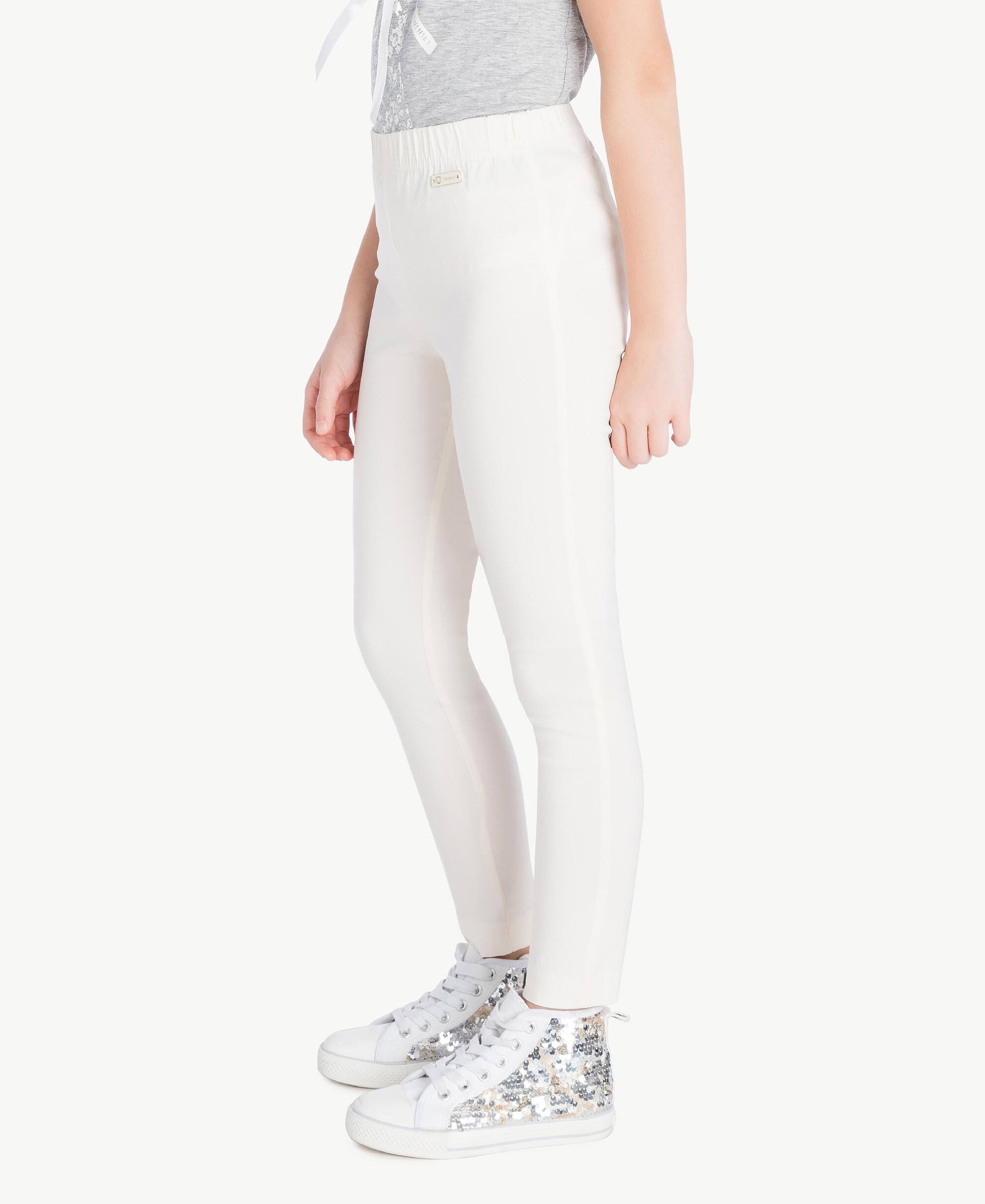 cream skinny trousers