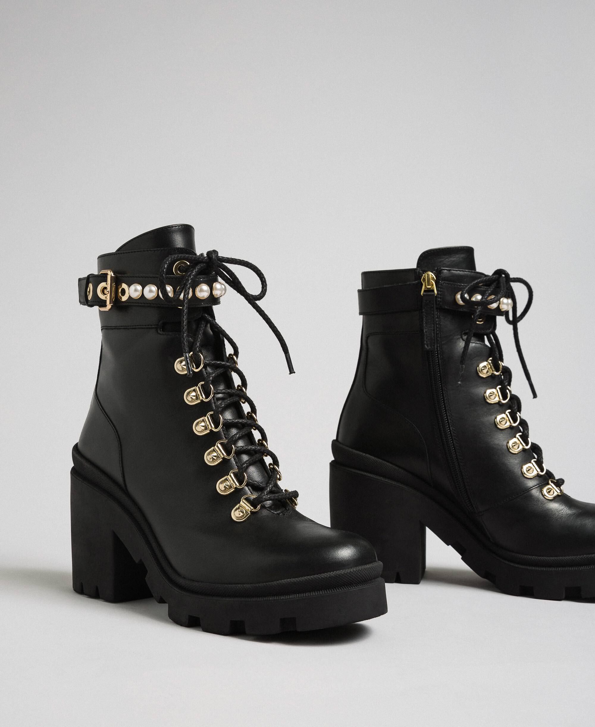 woman black work boots