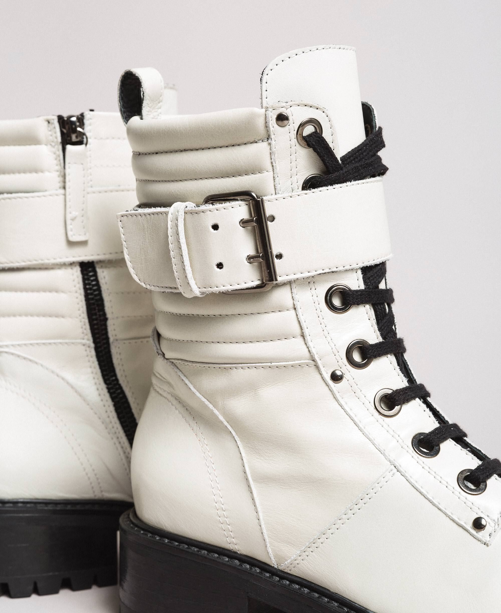 white leather lace up boots