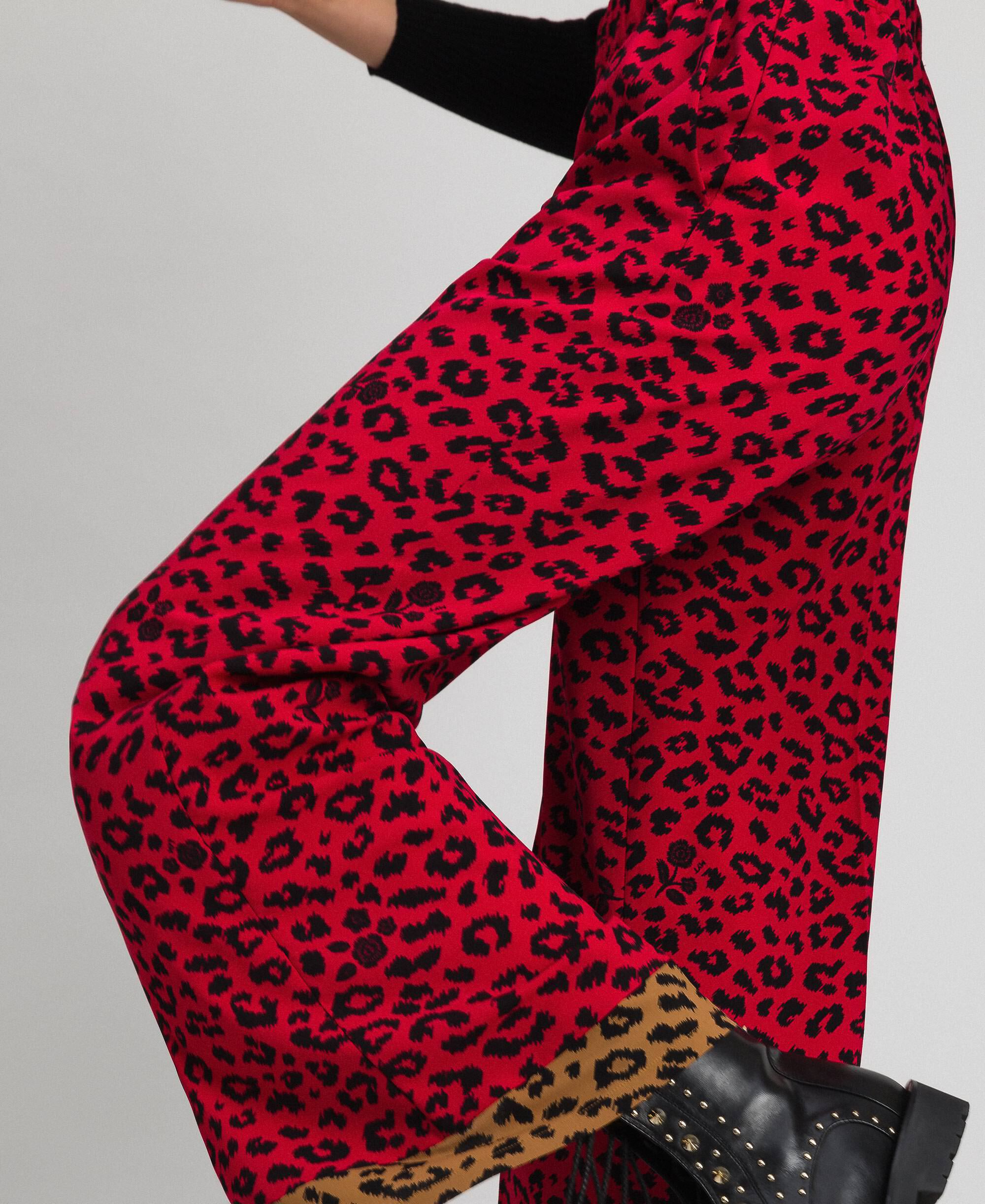 red animal print trousers