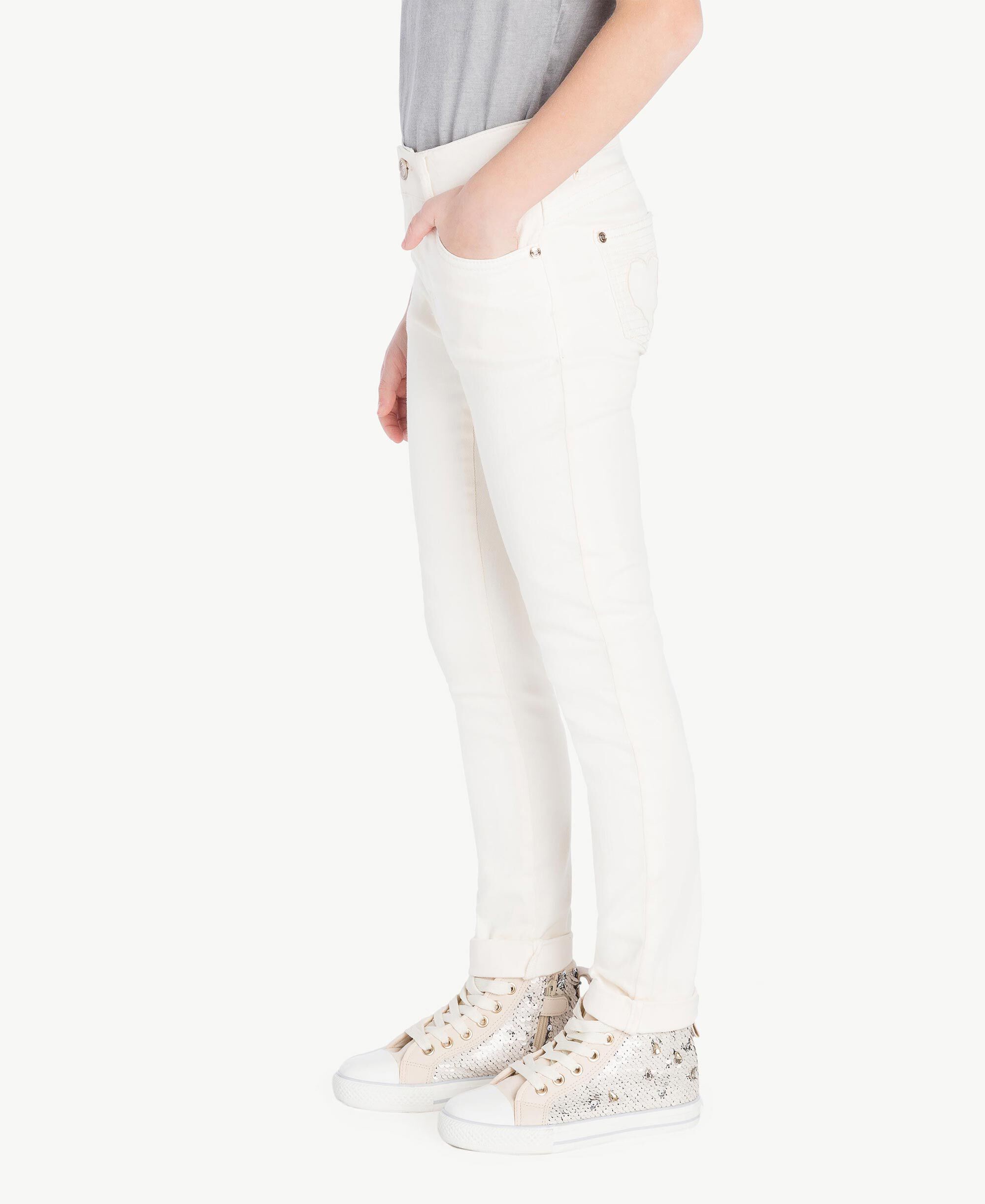 cream skinny trousers