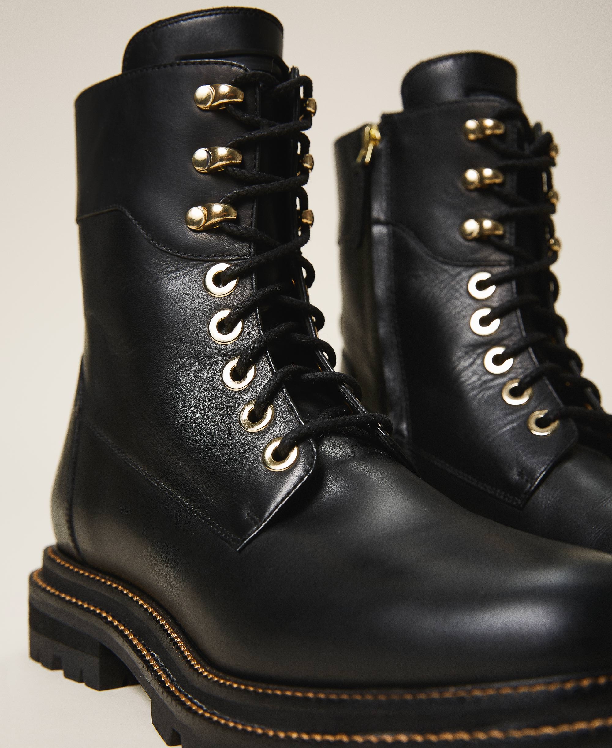 Tie-up leather combat boots Woman 