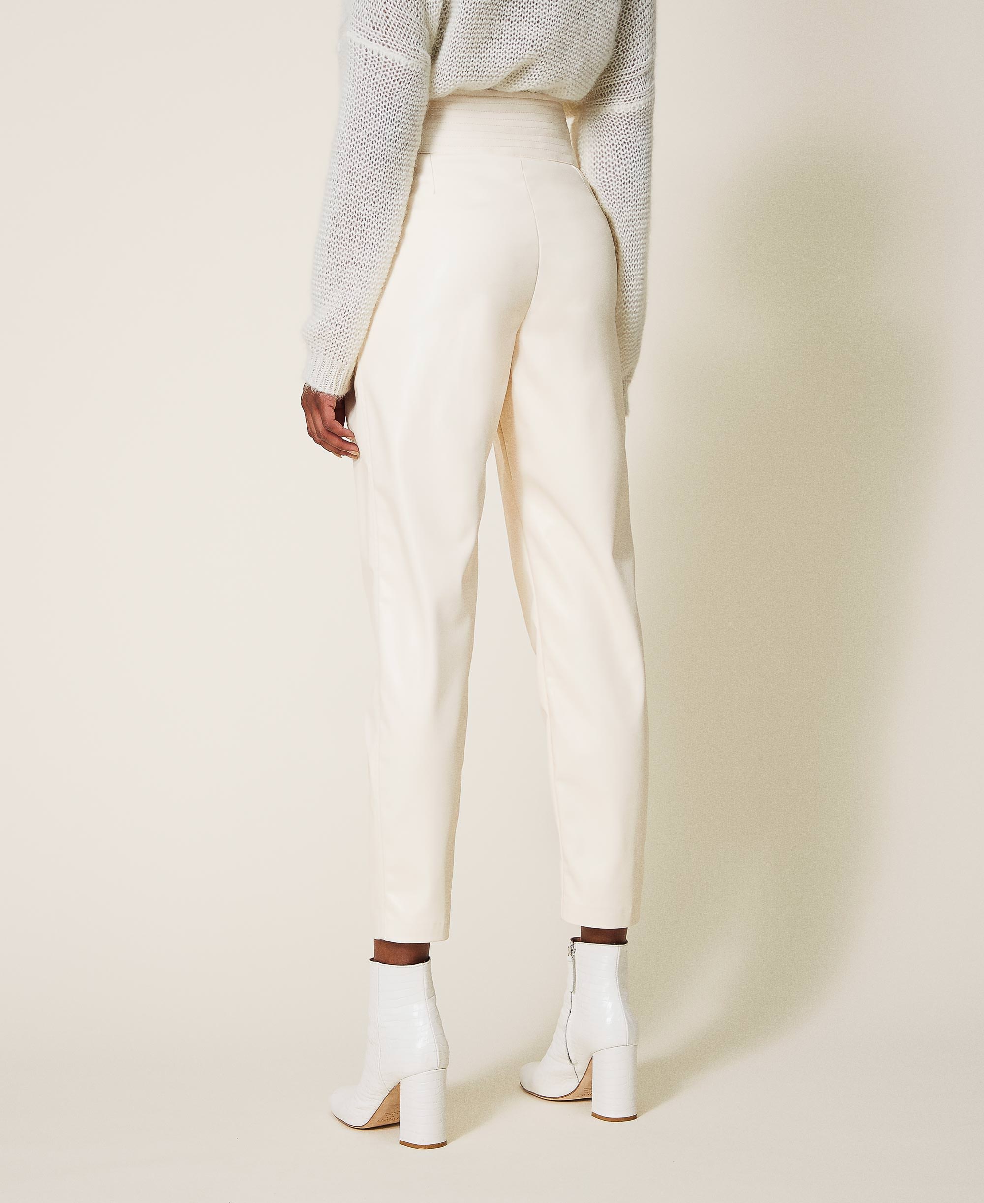 white leather look trousers