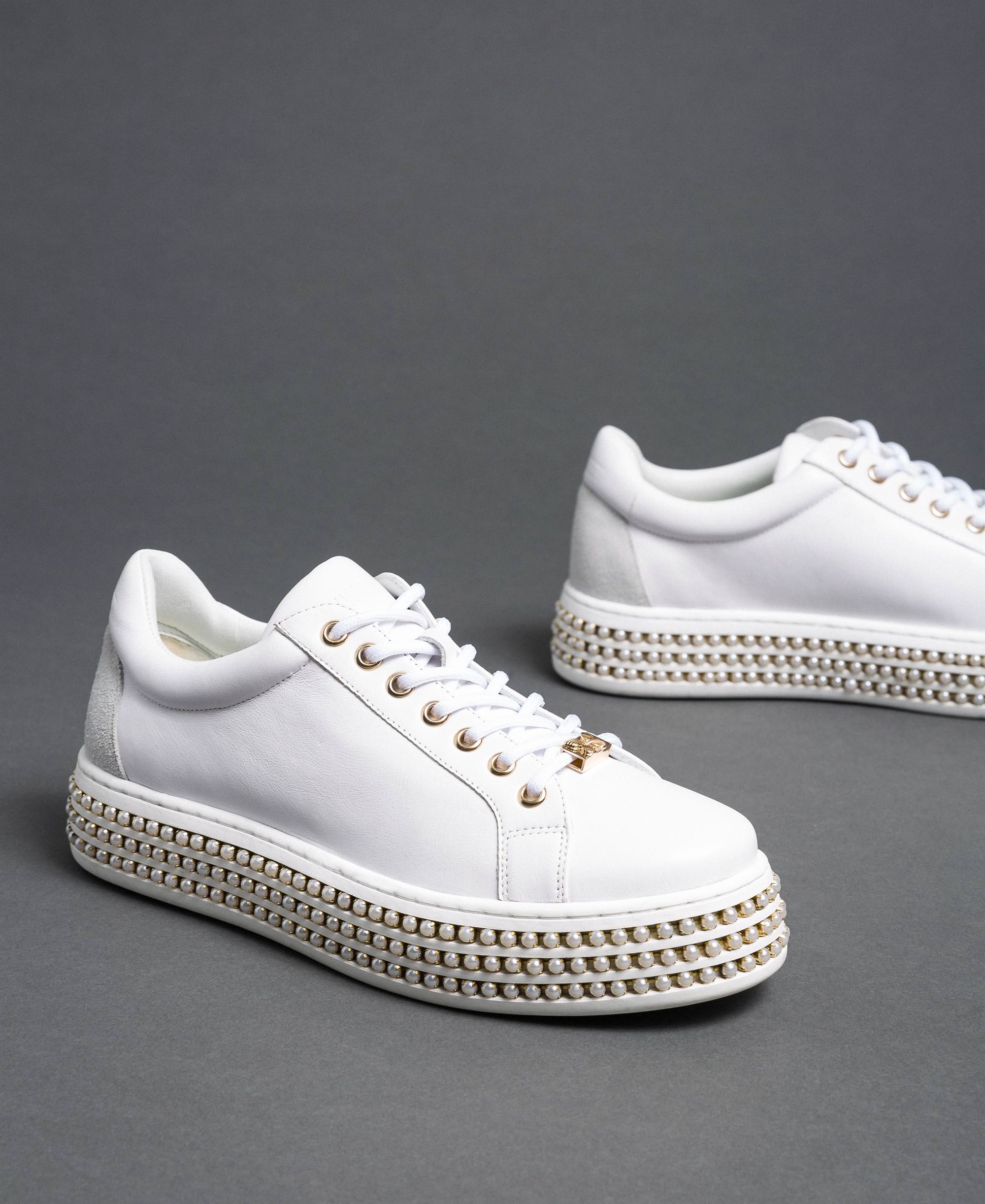 white sneakers with rubber sole