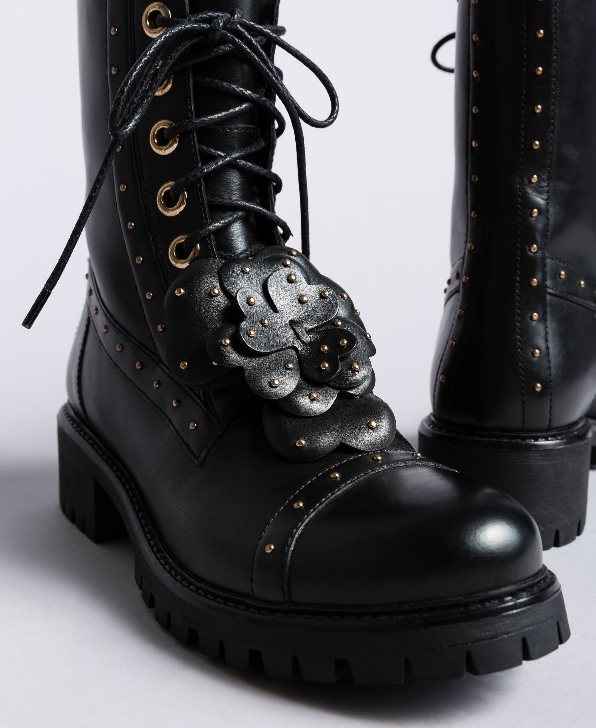 Leather combat boots with rivets