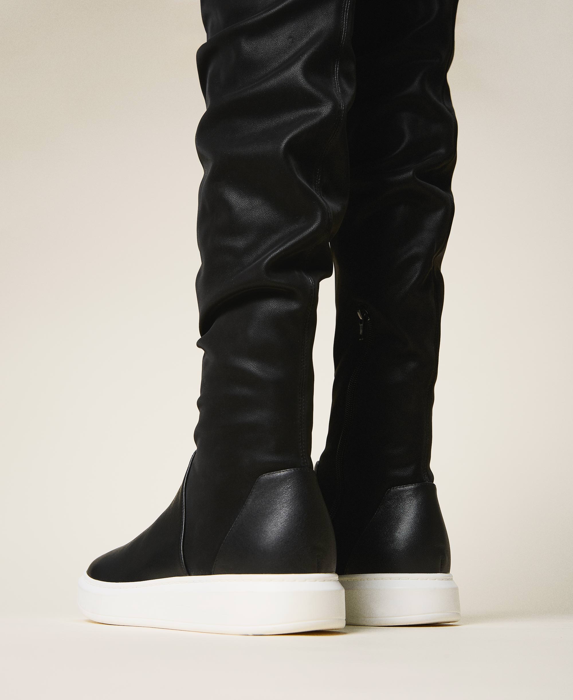 black leather trainer boots