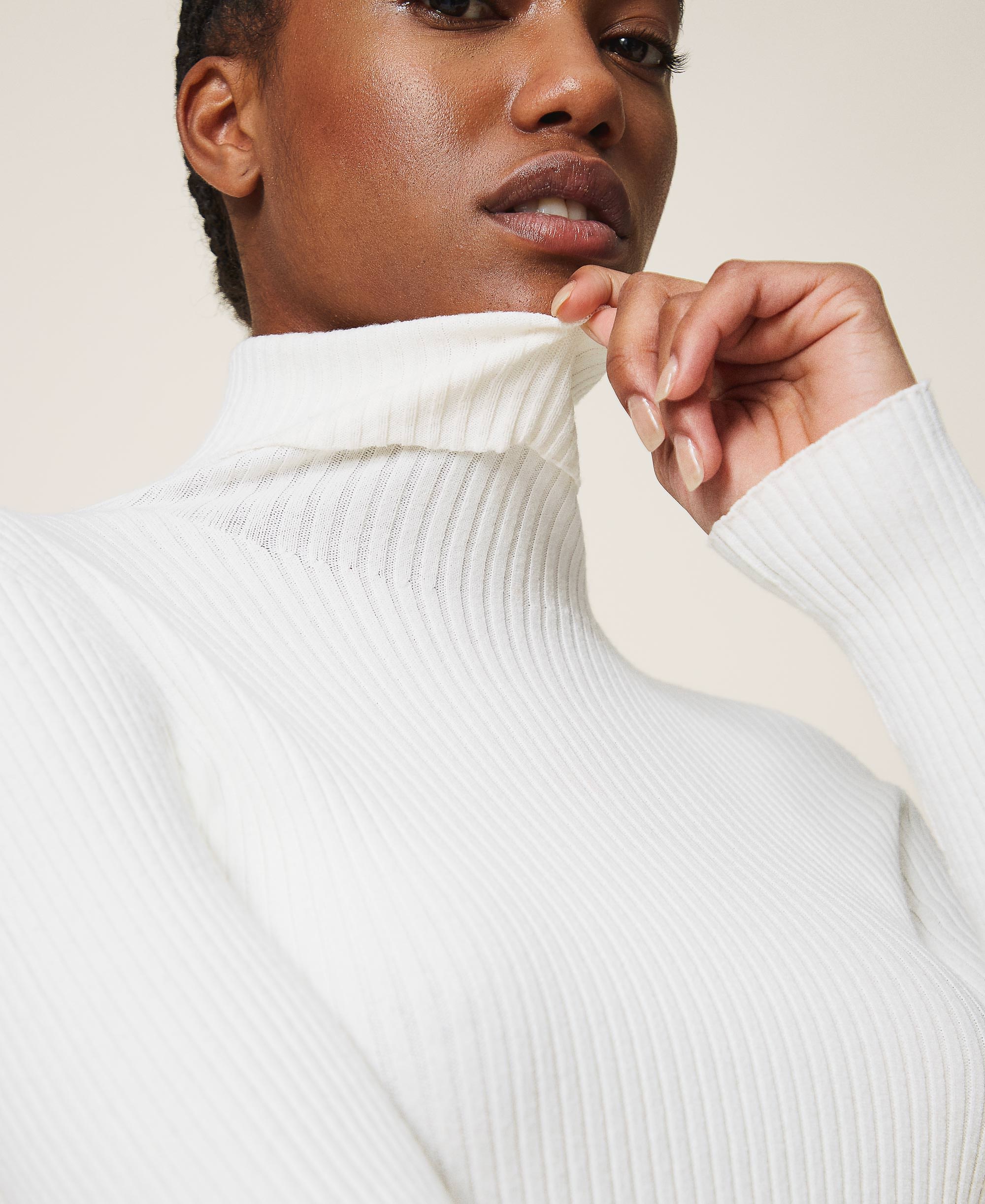 white jumper turtleneck