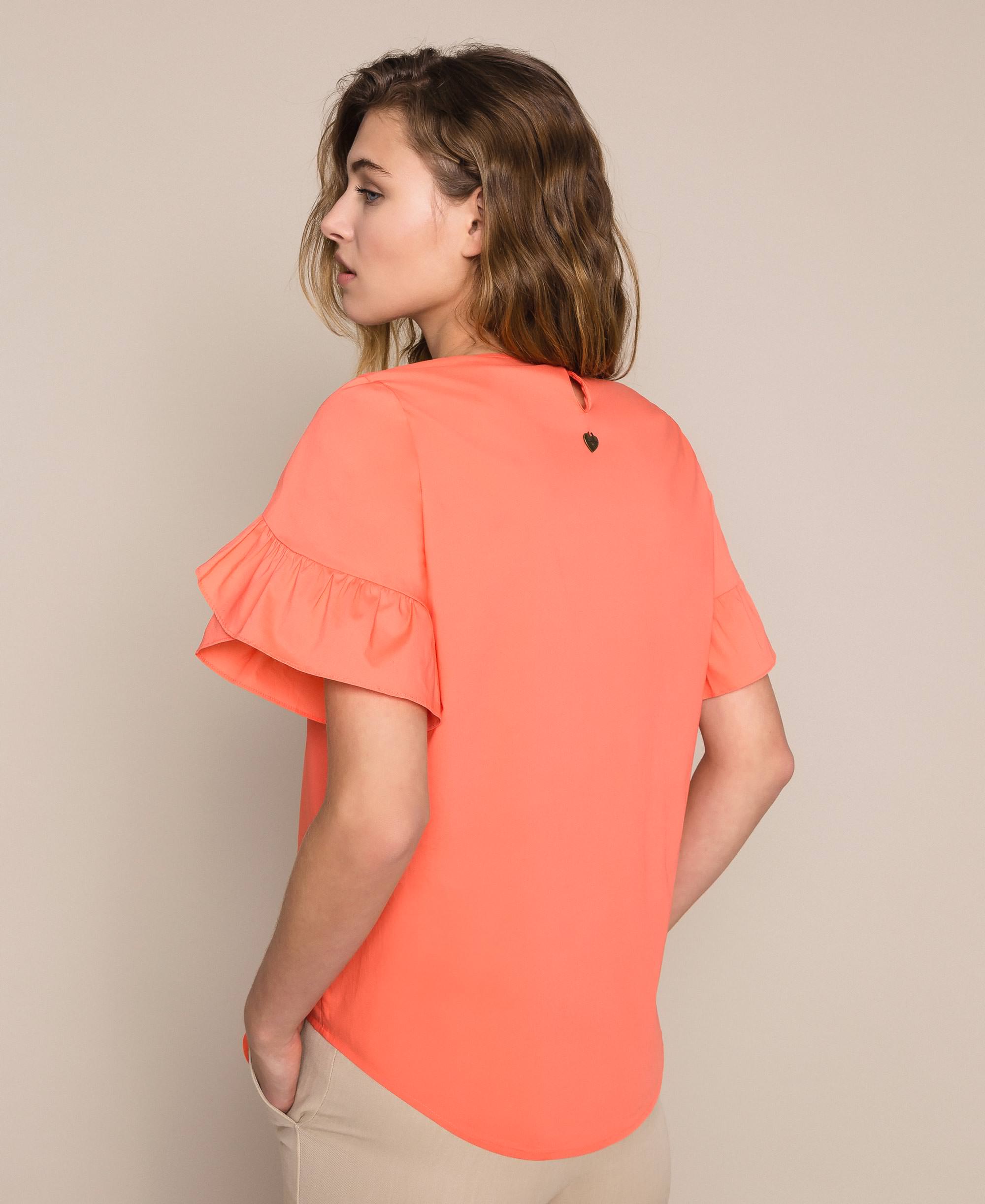 orange ruffle blouse