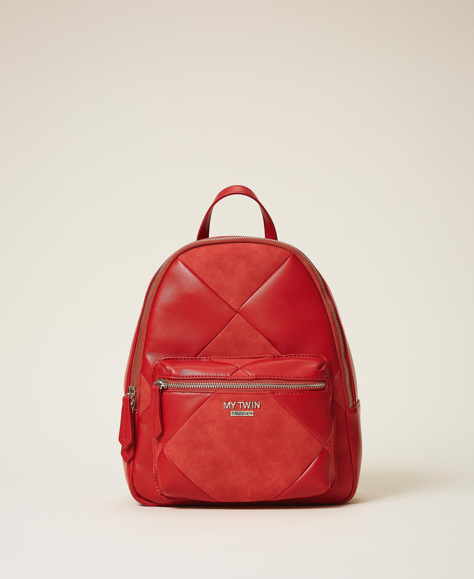 red faux leather backpack