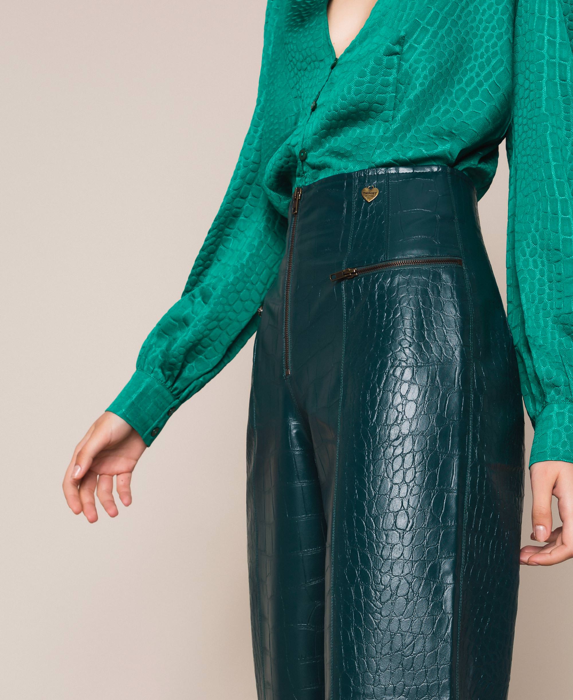 green leather look trousers