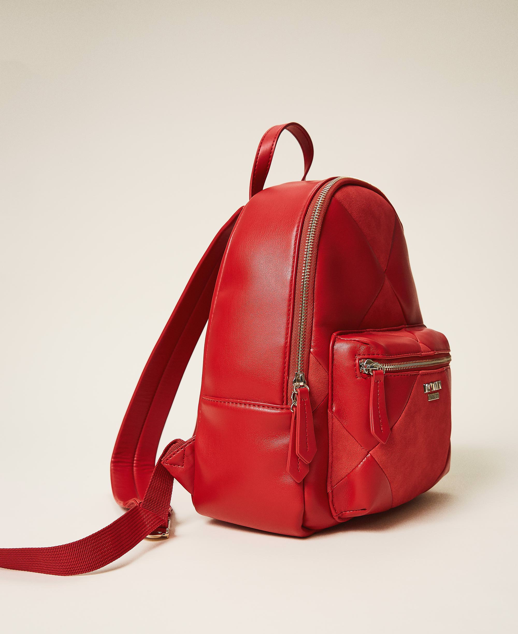 red faux leather backpack