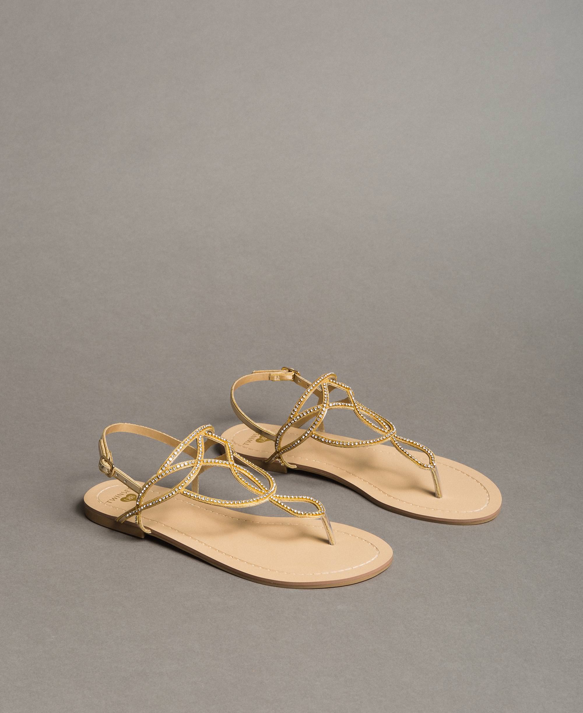 Flat thong sandals with rhinestones