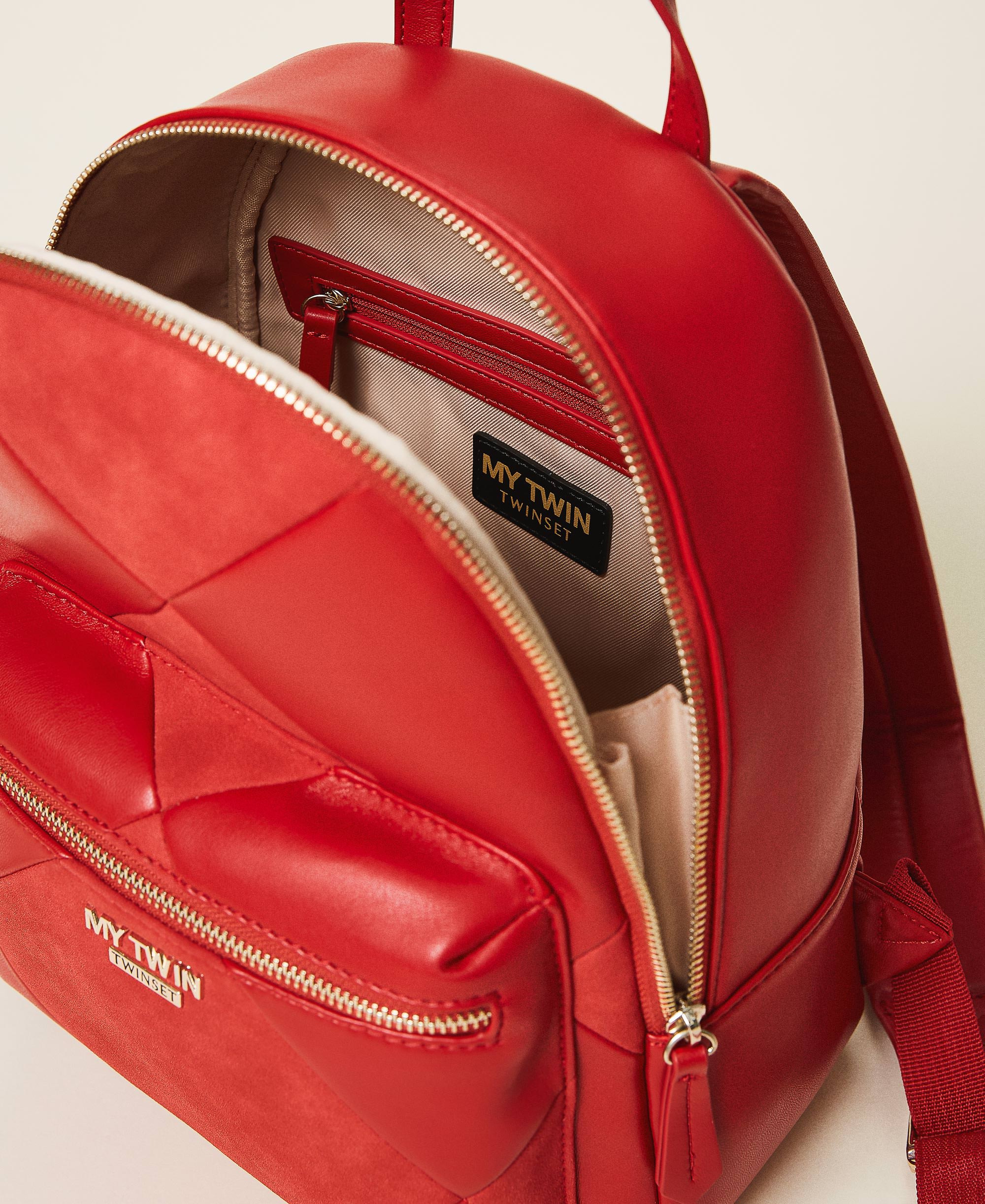 red faux leather backpack