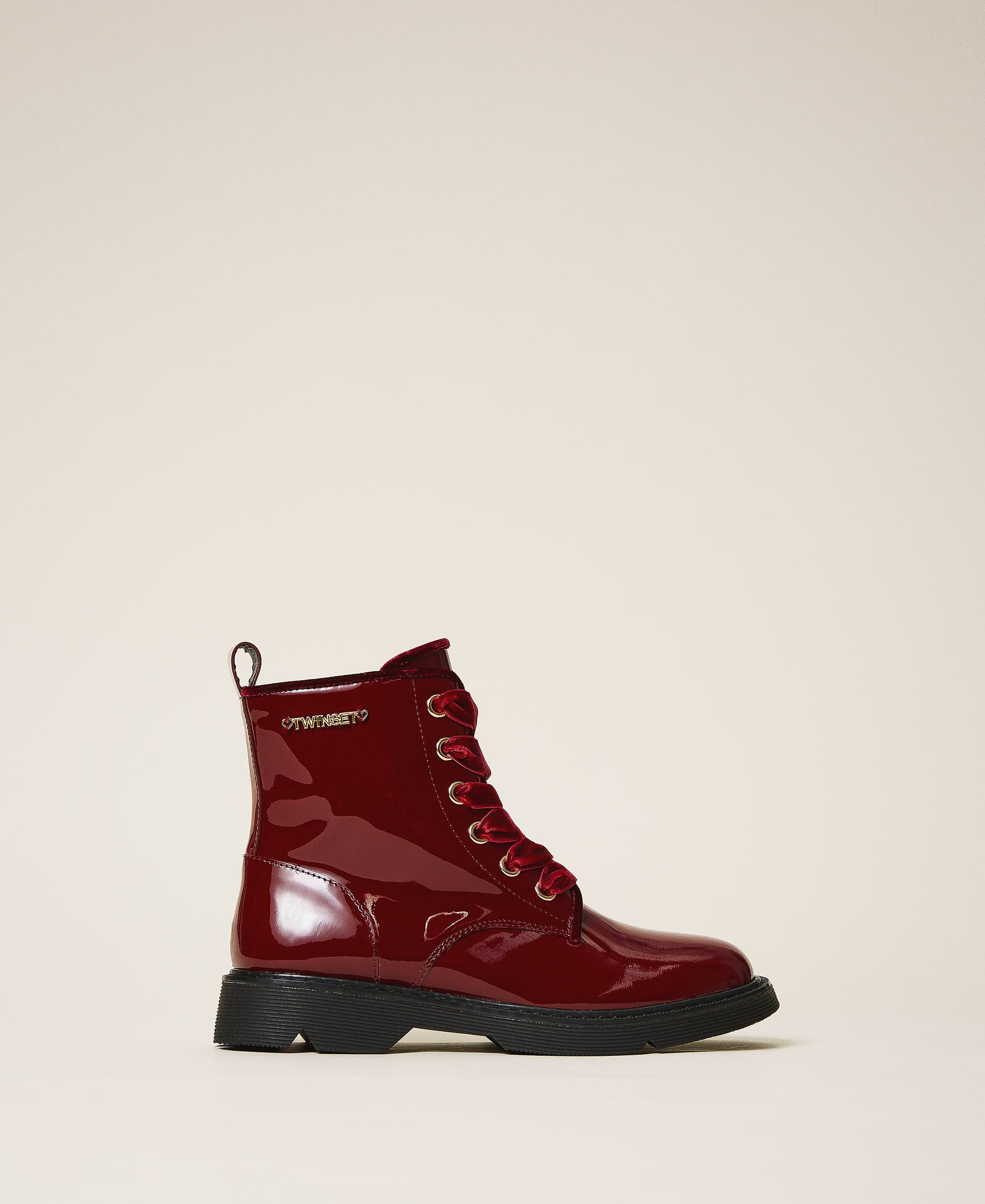 Patent leather combat boots with logo 