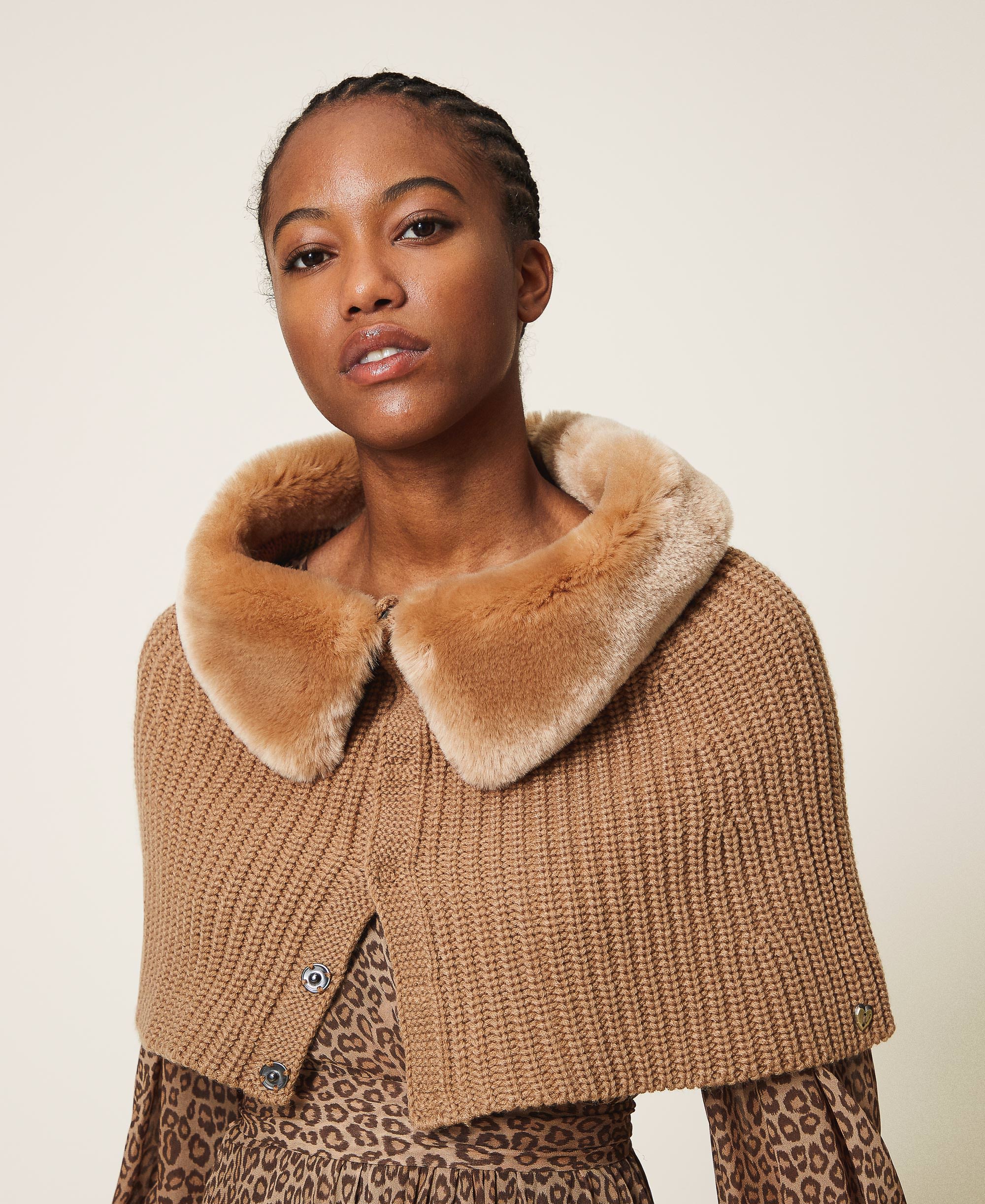 woman in hat and fur collar